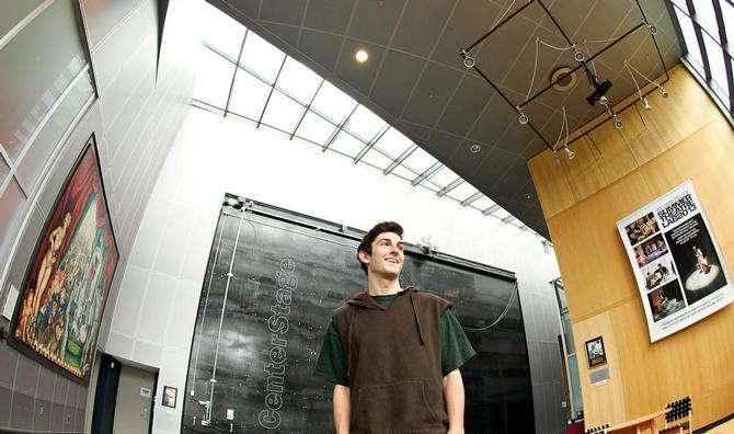 Brian Evans '15 poses in the lobby at his internship at the Williamstown Theatre Festival.